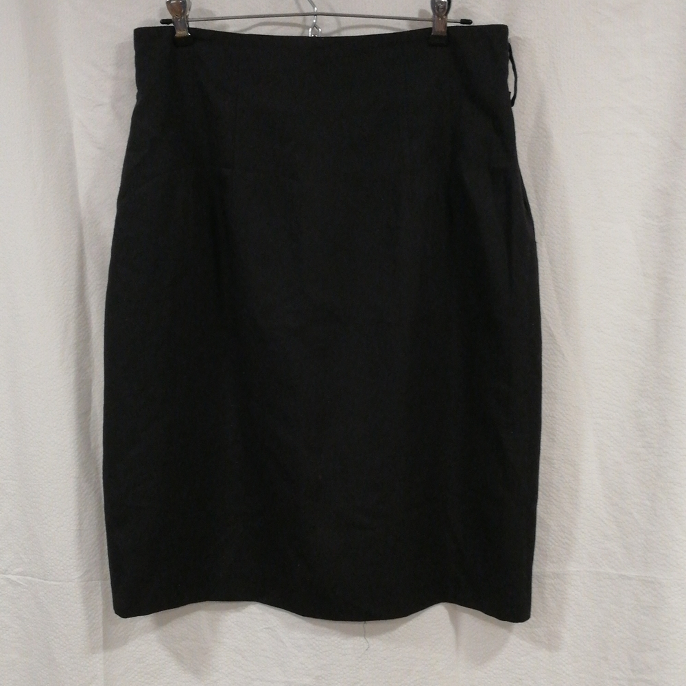 Black skirt with kick pleat